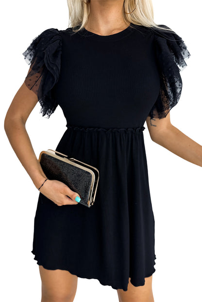 Haut en maille côtelée à volants et manches en maille à pois