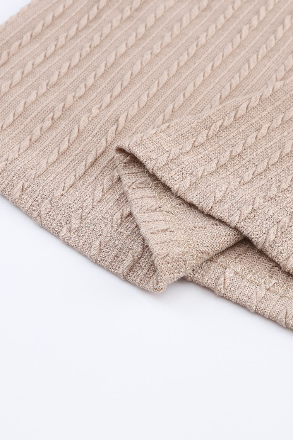 Haut noir en tricot jacquard à col en V et manches lanternes