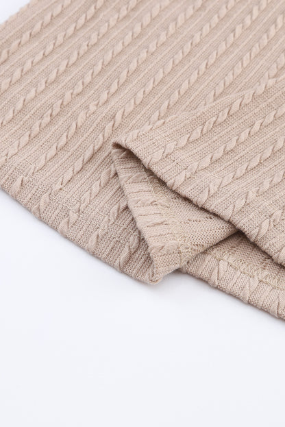 Haut noir en tricot jacquard à col en V et manches lanternes