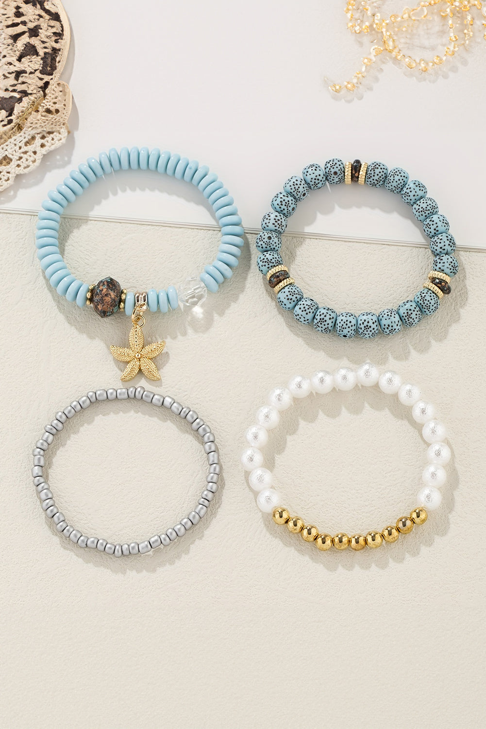 Ensemble de 4 bracelets de perles avec pendentif étoile de mer bleu clair