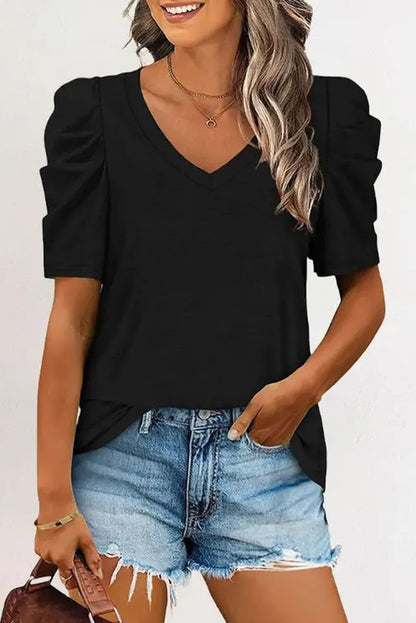 Camiseta con cuello en V y mangas abullonadas 