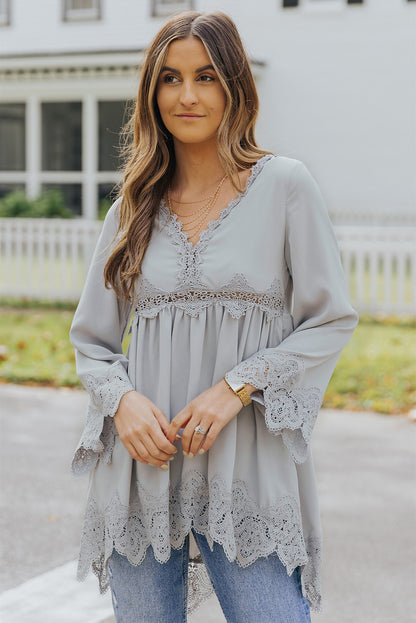 Chemisier à manches cloche et empiècements en crochet