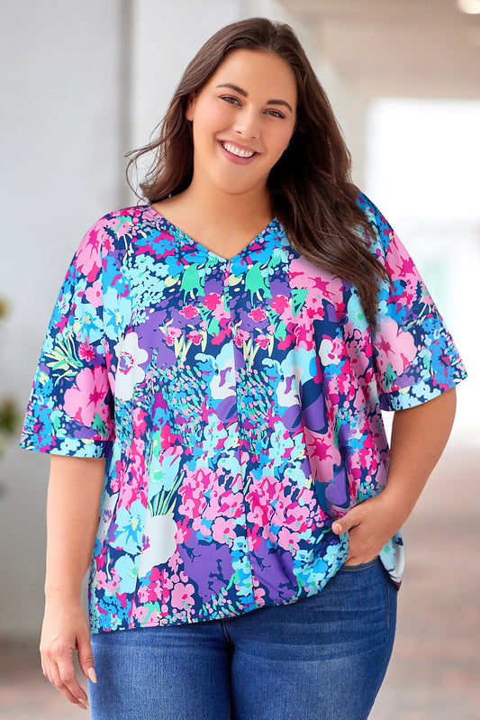 Blusa floral de talla grande con manga dolman y cuello en V multicolor