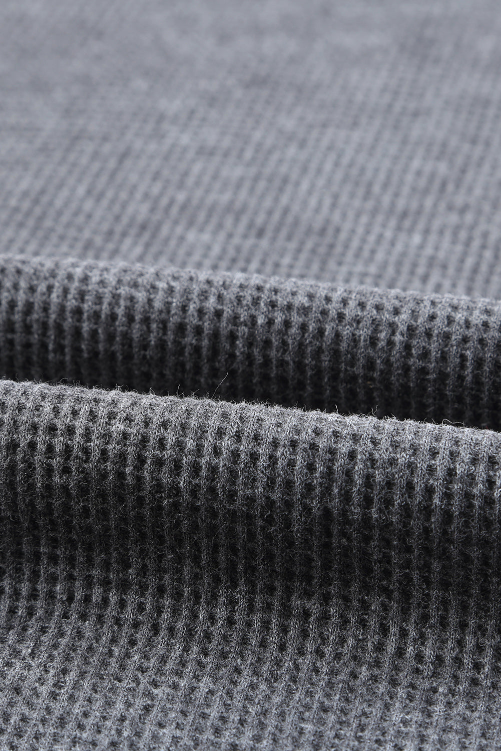 Top tipo jersey con abertura lateral y punto tipo gofre 