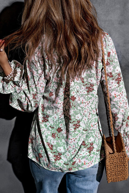 Blusa con botones y cuello en V con estampado floral 