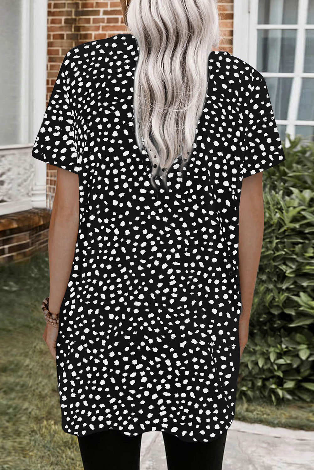 Top tipo túnica con bolsillos laterales estampados