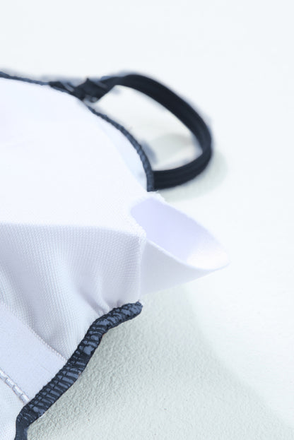 Maillot de bain une pièce bleu marine côtelé avec cordon de serrage et découpes sur les côtés