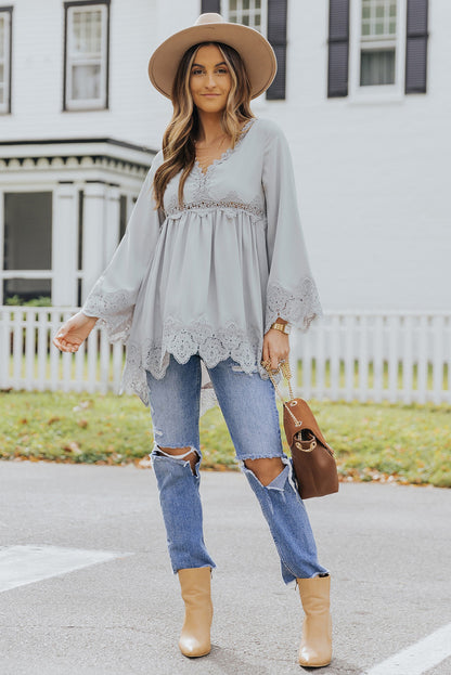 Chemisier à manches cloche et empiècements en crochet