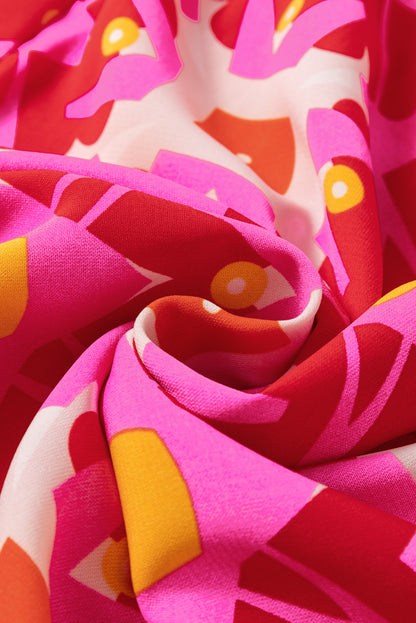 Robe longue à col en V et imprimé géométrique rose fraise