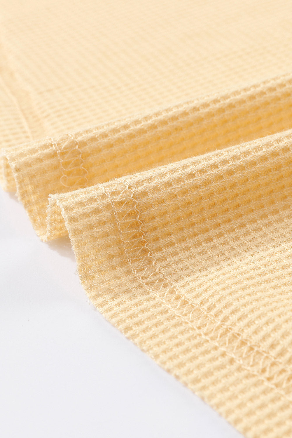 Top de manga larga con botones de punto tipo gofre marrón 