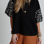 Haut oversize à manches bouffantes et imprimé floral contrasté noir