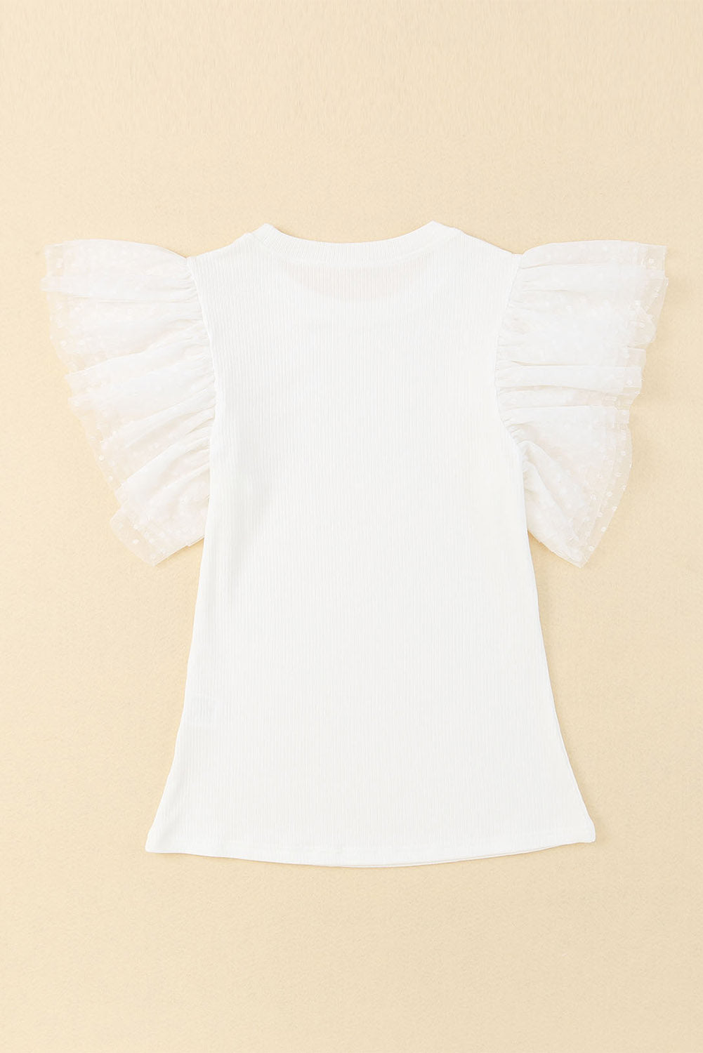 Haut en maille côtelée à volants et manches en maille à pois