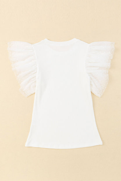 Haut en maille côtelée à volants et manches en maille à pois