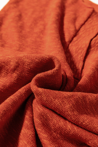 Pull orange uni à manches courtes et col en V fendu