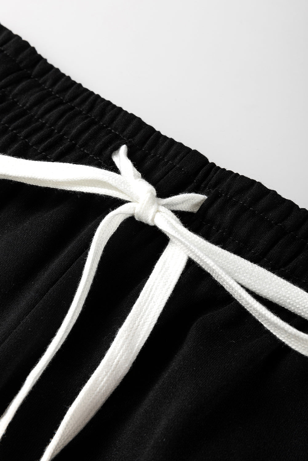 Ensemble pull à rayures noires et pantalon de jogging à épaules tombantes