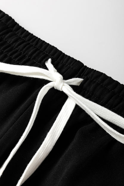 Ensemble pull à rayures noires et pantalon de jogging à épaules tombantes