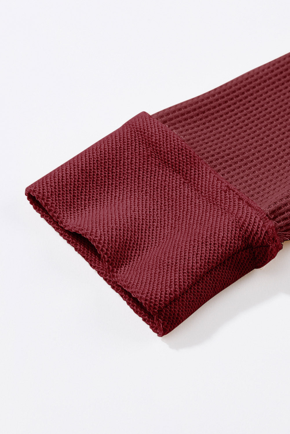 Top de manga larga con botones de punto tipo gofre marrón 