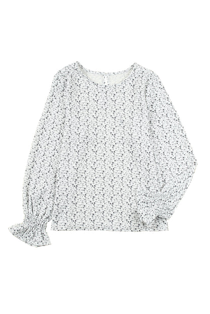 Blusa con mangas de burbuja con volantes arrugados y estampado floral negro 