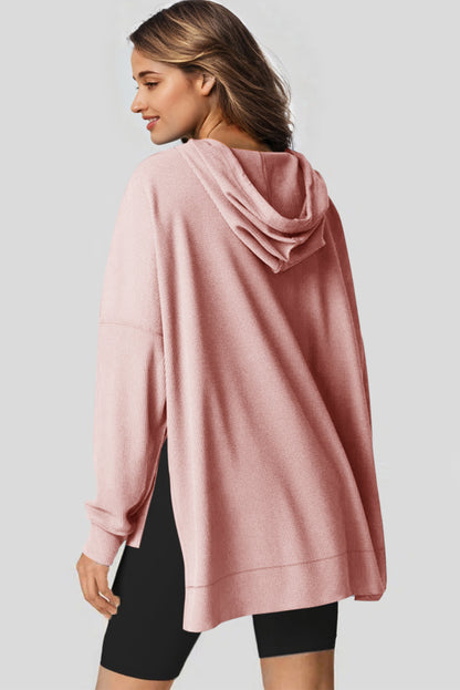 Sweat à capuche surdimensionné rose clair en tricot gaufré doublé polaire à col montant