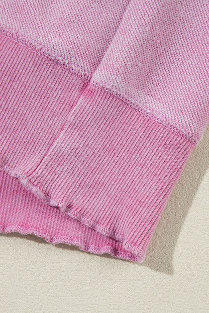 Sweat-shirt raglan rose en maille gaufrée avec coutures apparentes