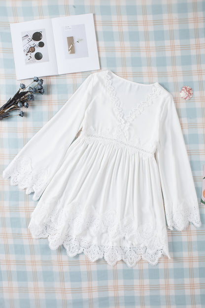 Chemisier à manches cloche et empiècements en crochet