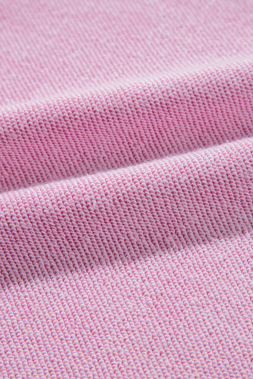 Sweat-shirt raglan rose en maille gaufrée avec coutures apparentes