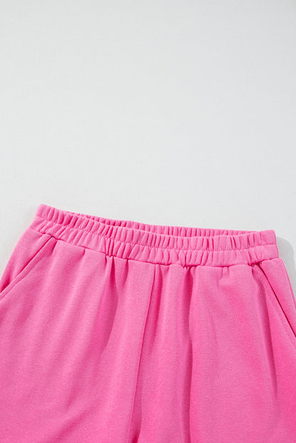 Ensemble haut à manches longues et short rose à imprimé patchwork