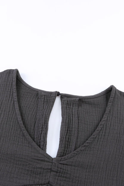 Minivestido babydoll enrollable de manga corta con cuello en V