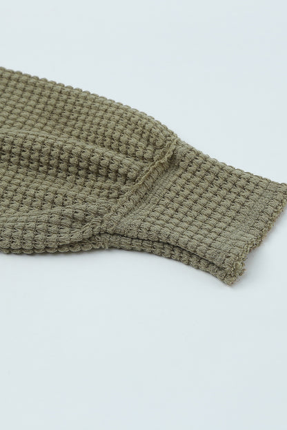 Haut ample en tricot gaufré à col fendu et poches