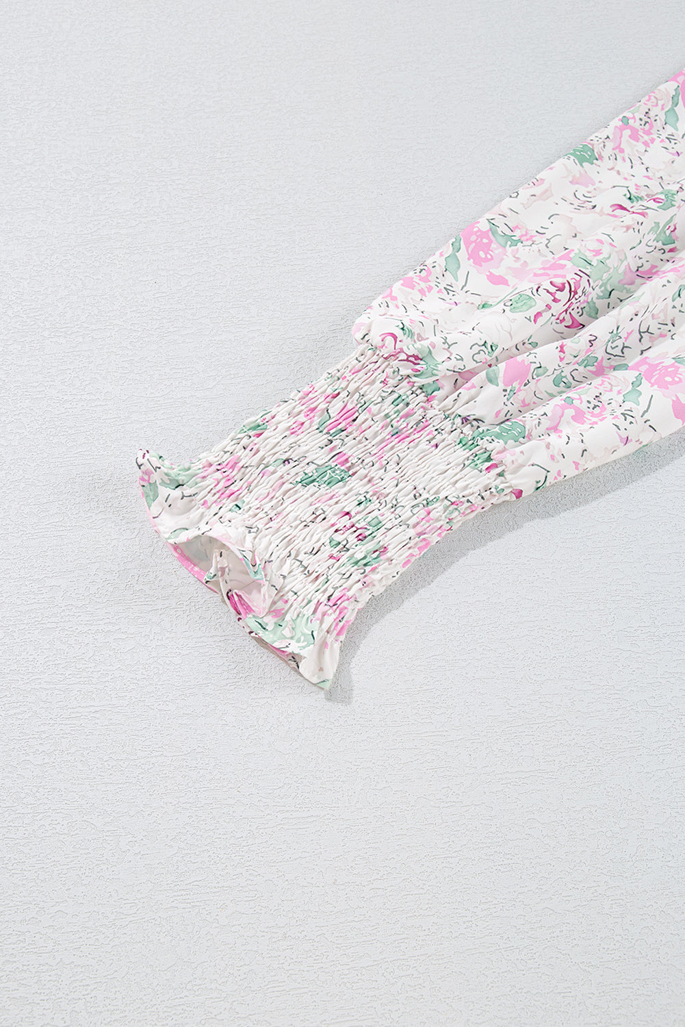 Chemisier babydoll rose à imprimé floral, manches ballon froncées, dos troué