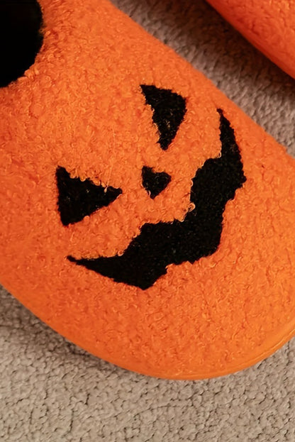 Chaussons en peluche orange à motif citrouille d'Halloween