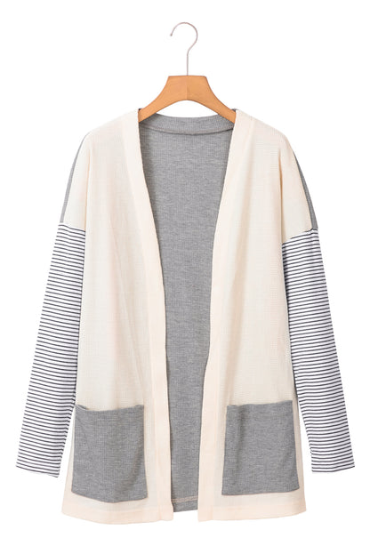 Cardigan ouvert à rayures noires et patchwork avec poche