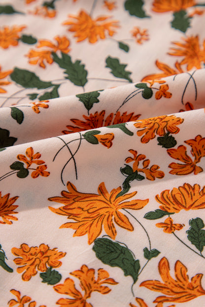 Robe babydoll beige à fleurs, décolleté en V profond, buste froncé, manches bouffantes