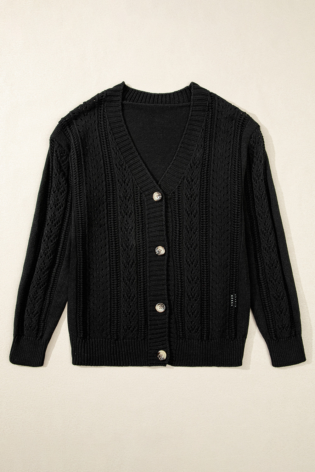 Cardigan noir en maille ouverte à épaules tombantes