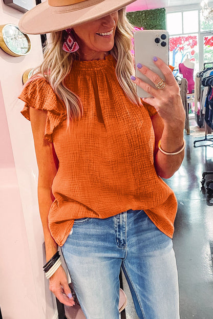 Chemisier texturé à manches flottantes et col à volants 