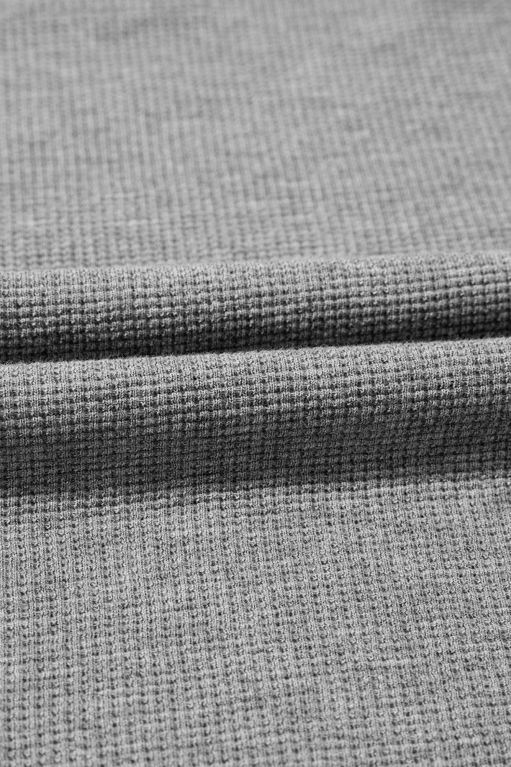 Haut surdimensionné fendu à manches évasées en tricot gaufré gris