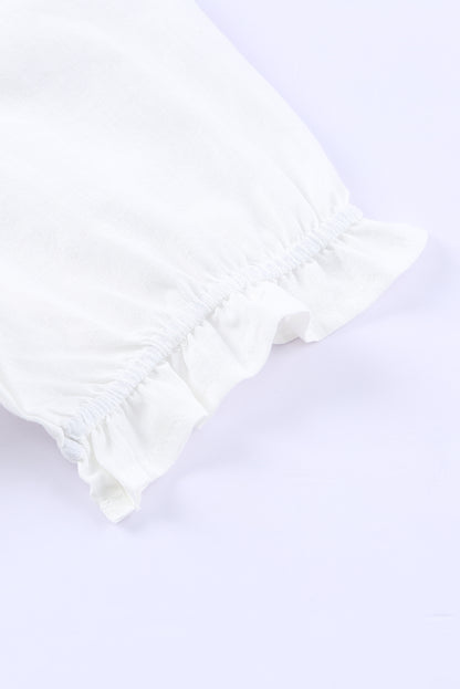 Blusa de manga farol con volantes y bordado floral 