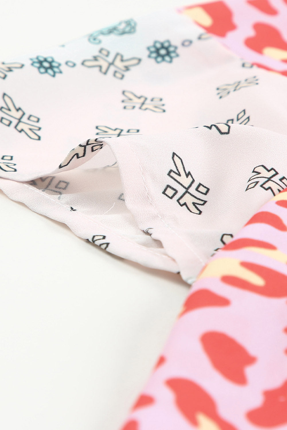 Haut cape multicolore à imprimé animal et floral