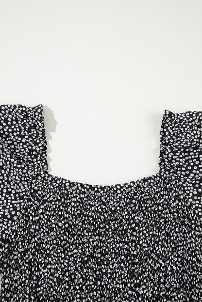 Robe mi-longue noire à imprimé floral et manches longues à col carré