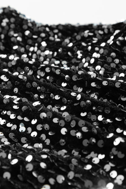 Veste courte ouverte à paillettes noires
