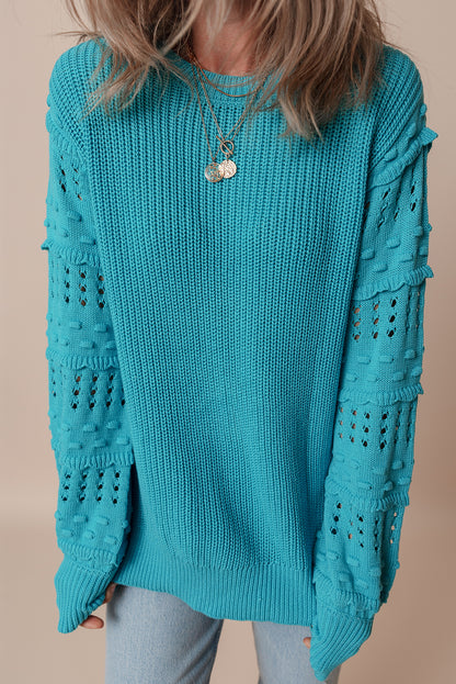Pull turquoise à volants et manches bouffantes