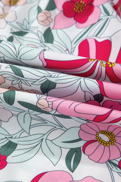 Chemisier à manches courtes à imprimé floral rose et bordure à volants contrastés