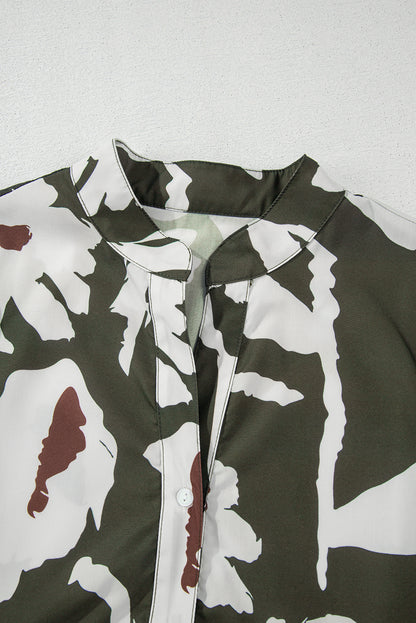 Chemisier à manches bouffantes et demi-bouton à imprimé floral abstrait trèfle à quatre feuilles