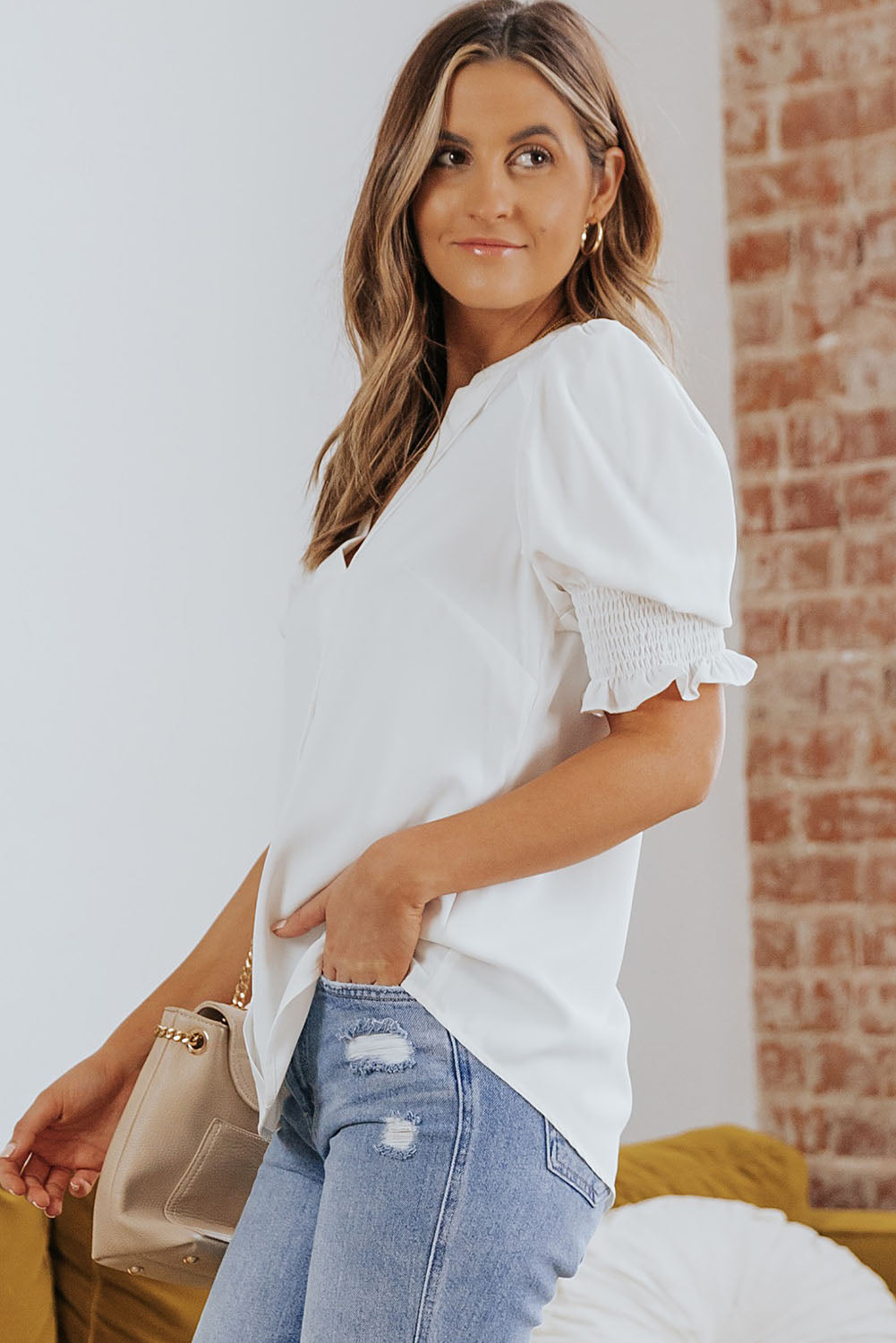 Blusa con cuello en V y media manga de color liso