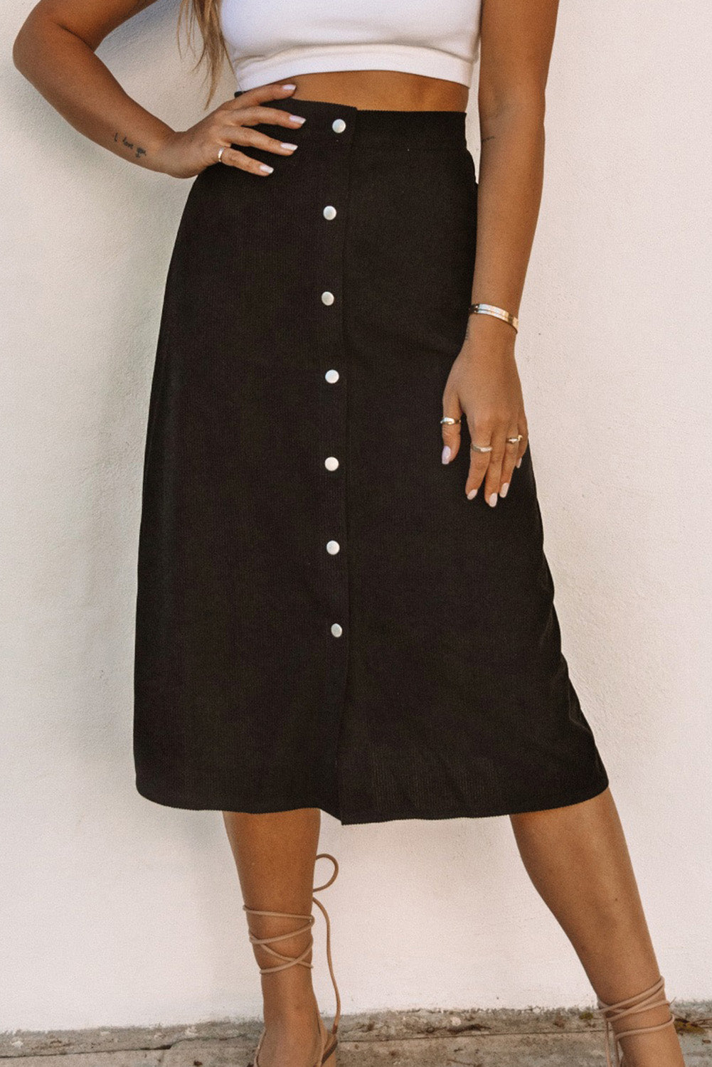 Falda de pana con botonadura sencilla