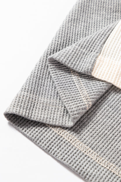 Cardigan ouvert à rayures noires et patchwork avec poche