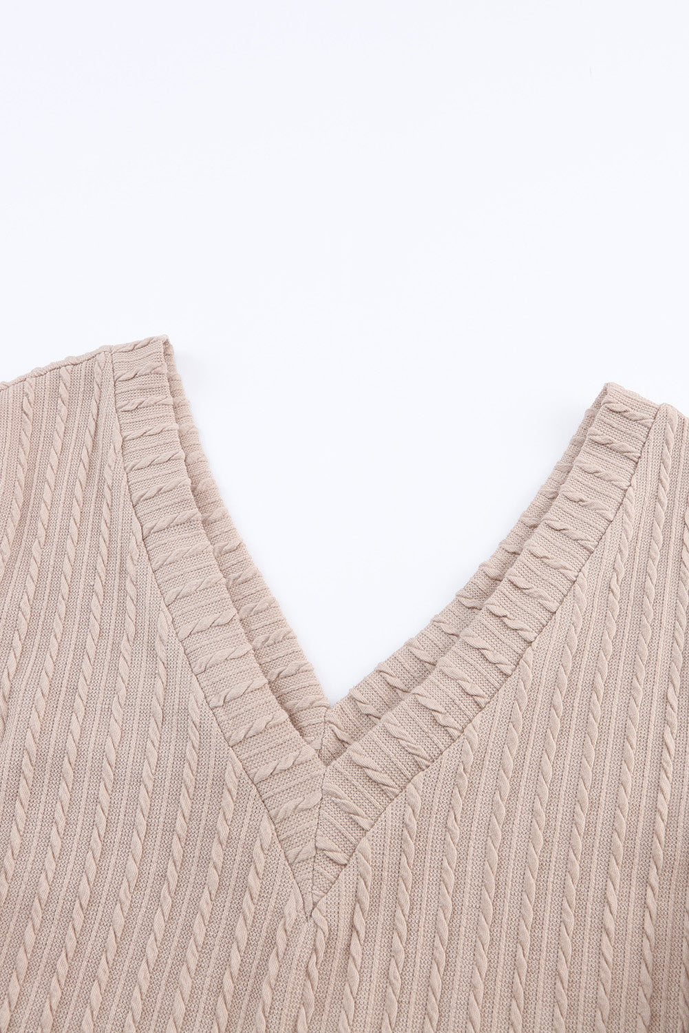 Haut noir en tricot jacquard à col en V et manches lanternes