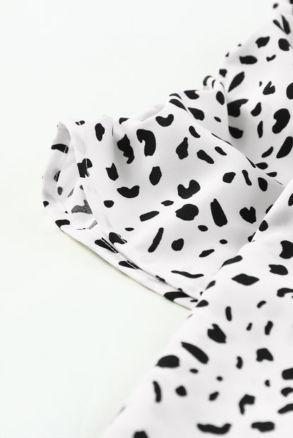 Blusa con mangas abullonadas y detalle fruncido