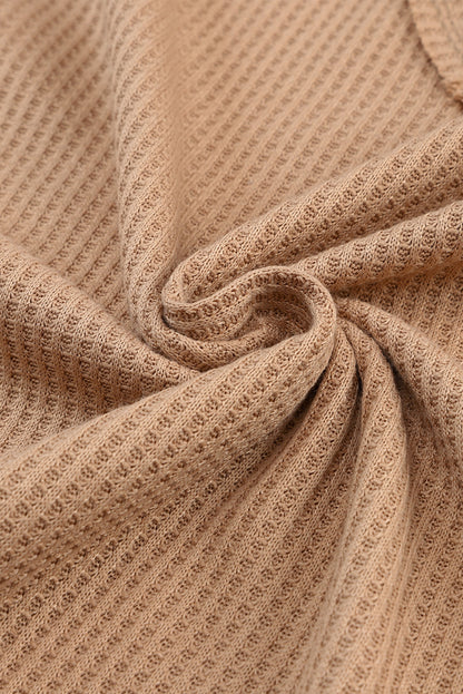 Haut à manches longues et col en V en dentelle gaufrée rose