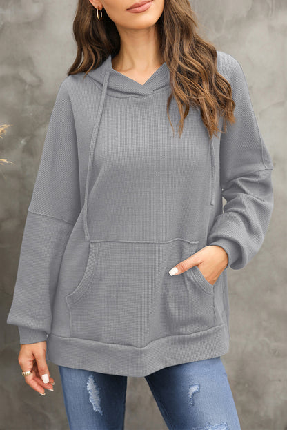 Sweat à capuche surdimensionné gris en tricot gaufré doublé polaire